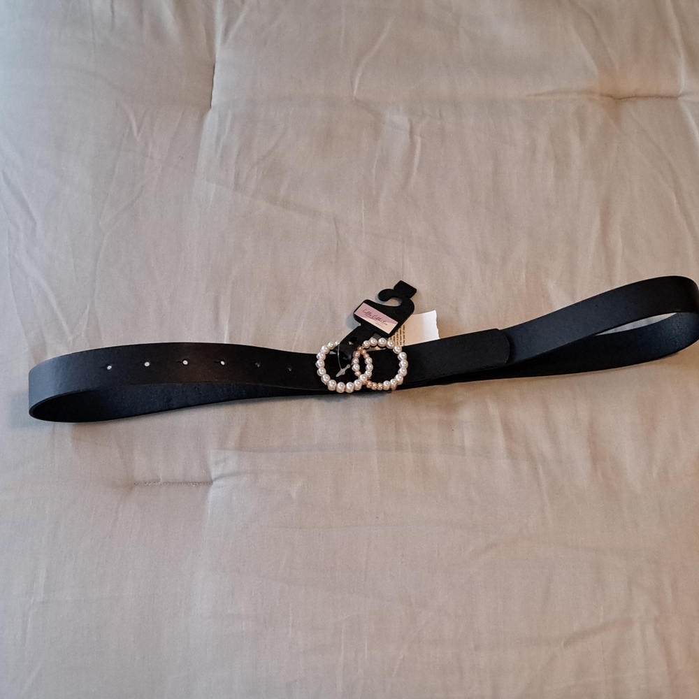 Black belt with pearl buckle